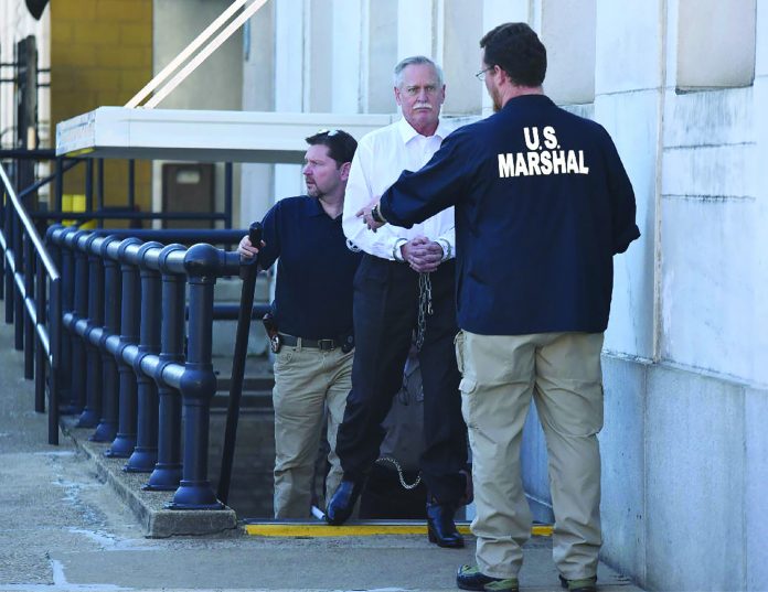 Robert Doggart, convicted on four criminal counts, is led to jail by federal marshals after his trial in Chattanooga, Tennessee. / Photo by Tim Barber/Times Free Press