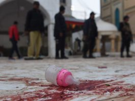 A child’s bottle forms part of the bloody debris at the shrine of Lal Shahbaz Qalandar.