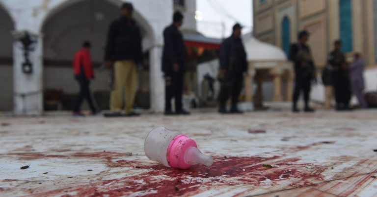 A child’s bottle forms part of the bloody debris at the shrine of Lal Shahbaz Qalandar.