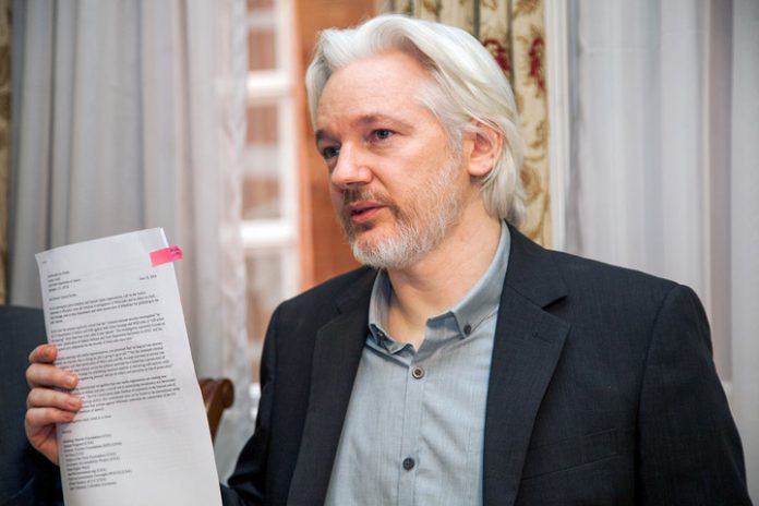 Wikileaks founder Julian Assange during a press conference in the Ecuador embassy, London, 2014. via Cancilleria del Ecuador
