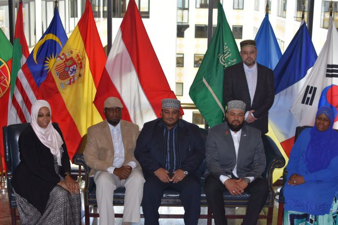 Members of The Muslims of America, Inc. conclude a press conference at the National Press Club in Washington, DC to draw attention to the atrocities being committed by Indian security forces against the Muslims of Kashmir. Announced also was the launch of a multi-dimensional awareness campaign and demand that the UN hold the plebiscite it resolved to in 1947 to give the Kashmiri people the right of self-determination.