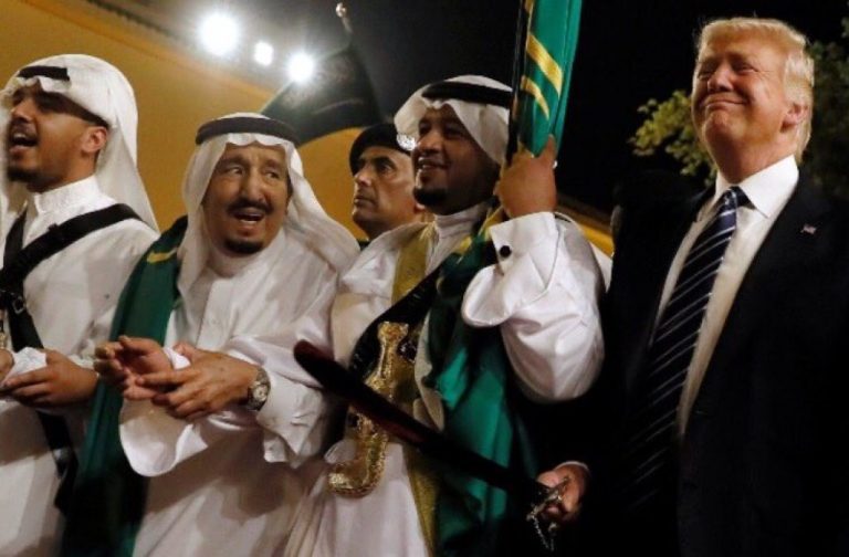 Caption: It is said that the sword dance, originally from Nejd, publicly displays the fighting strength of a tribe before a military engagement.