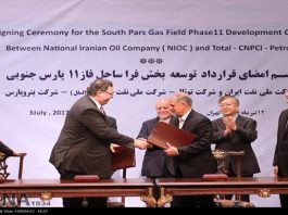 Iran signed a multibillion dollar deal with French oil giant Total and Chinese state oil company CNPC to further develop the country's giant South Pars Gas Field in cooperation with Iran's Petropars..jpg
