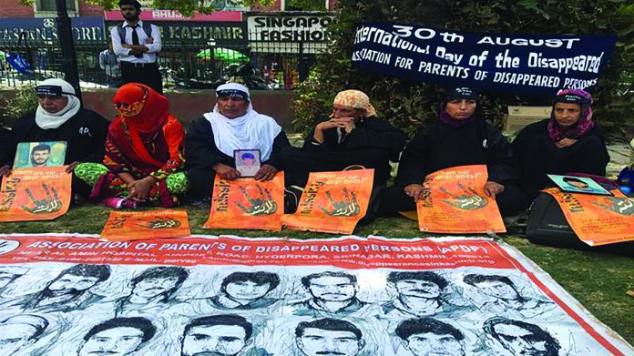 Victims gather in a Srinagar park to remember their loved ones, some of whom have not been seen for decades. Victims gather in a Srinagar park to remember their loved ones, some of whom have not been seen for decades.