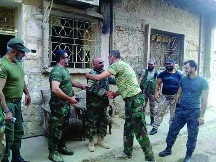 Syrian troops of the Brigade 137 base, surrounded by ISIS since 2014, were reunited with advancing army soldiers after they successfully lifted the lengthy siege of Deir Ezzor Tuesday. Image source: Al-Masdar News