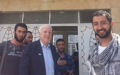 rom left to right: Abu Mosa – ISIS Press Officer, Abu Bakr Al-Baghdadi – Head of ISIS, Senator John McCain (R-AZ), Mohammad Noor – Syrian Terrorist, and Muaz Moustafa – Syrian Emergency Task Force at a meeting in Syria 2013.
