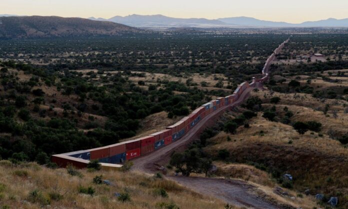 Wall of shipping containers